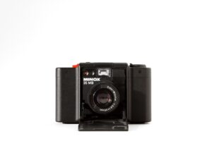 which polaroid land cameras have glass lenses metal body and zeiss ikon rangefinder